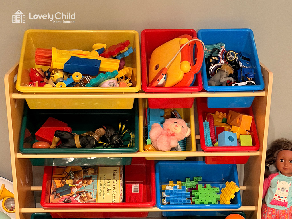Colorful toy storage bins organized on a shelf at Lovely Child Home Daycare