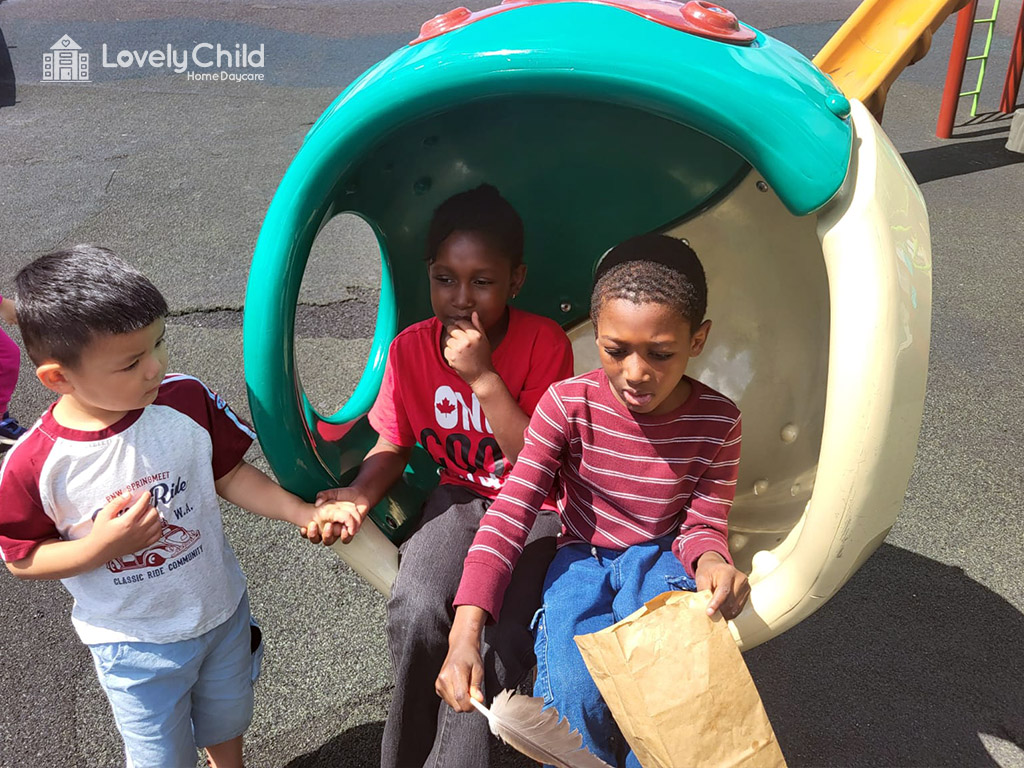 Children playing together on outdoor play equipment