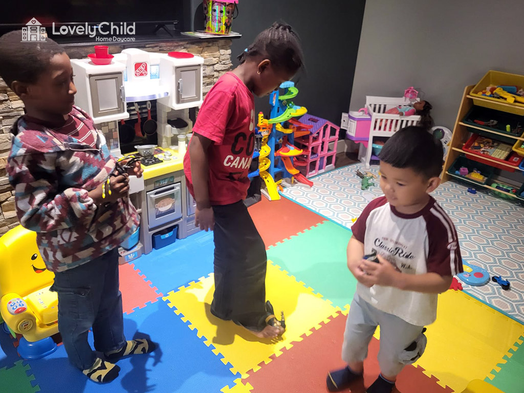 Children playing together in the indoor playroom